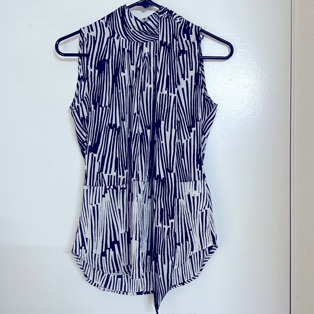 Animal print black & silver mock neck top with cute buttons on back